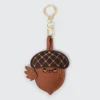 Cute acorn-shaped vegan leather keychain with stitched details and a gold ring, perfect for accessories and gifts.