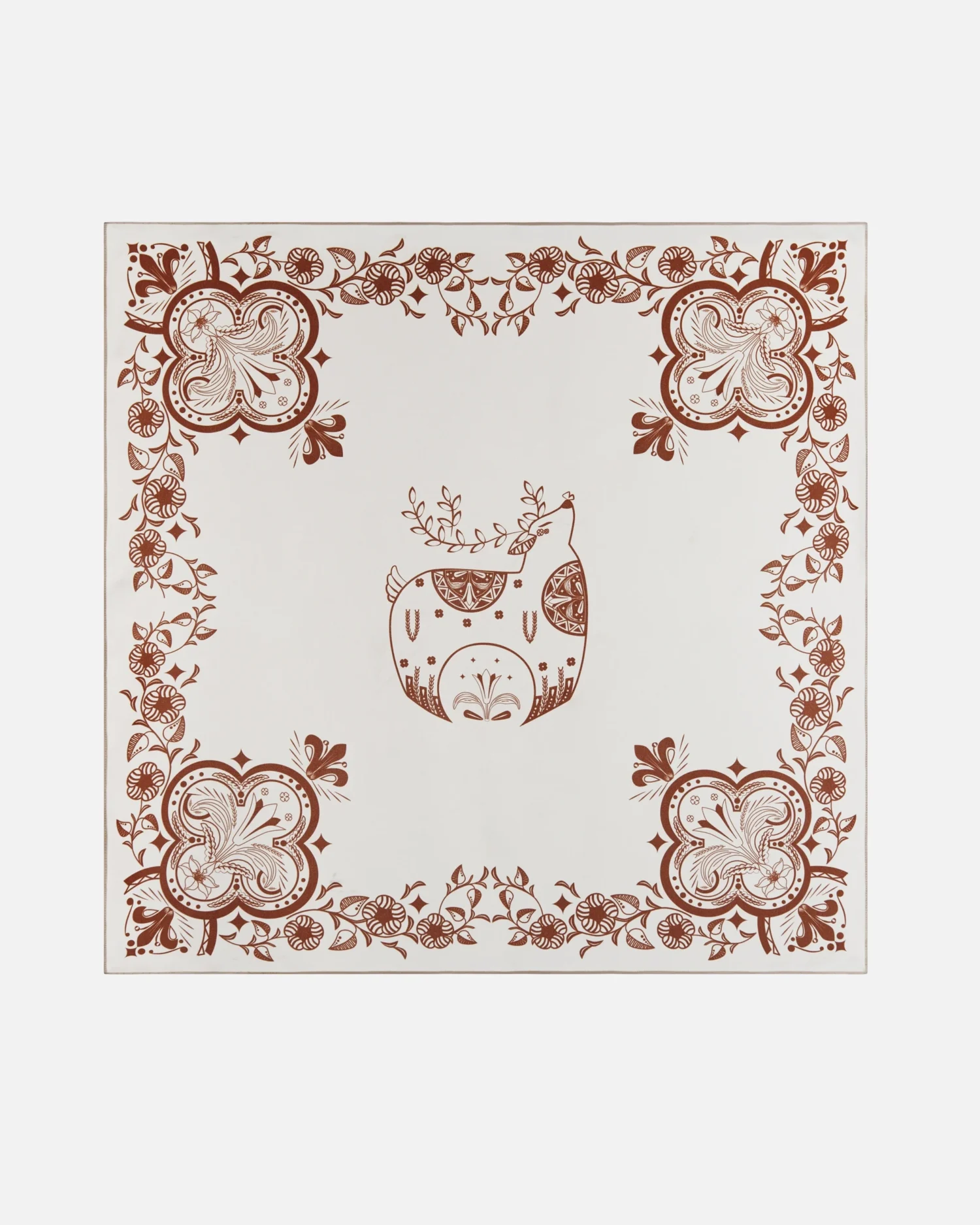 Intricate red patterned reindeer motif with floral border on elegant white background.