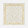 Elegant white and gold art deco patterned handkerchief with intricate border design on white background.