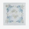 Elegant square scarf with seashell and starfish design on a pale blue background, featuring intricate coral patterns.