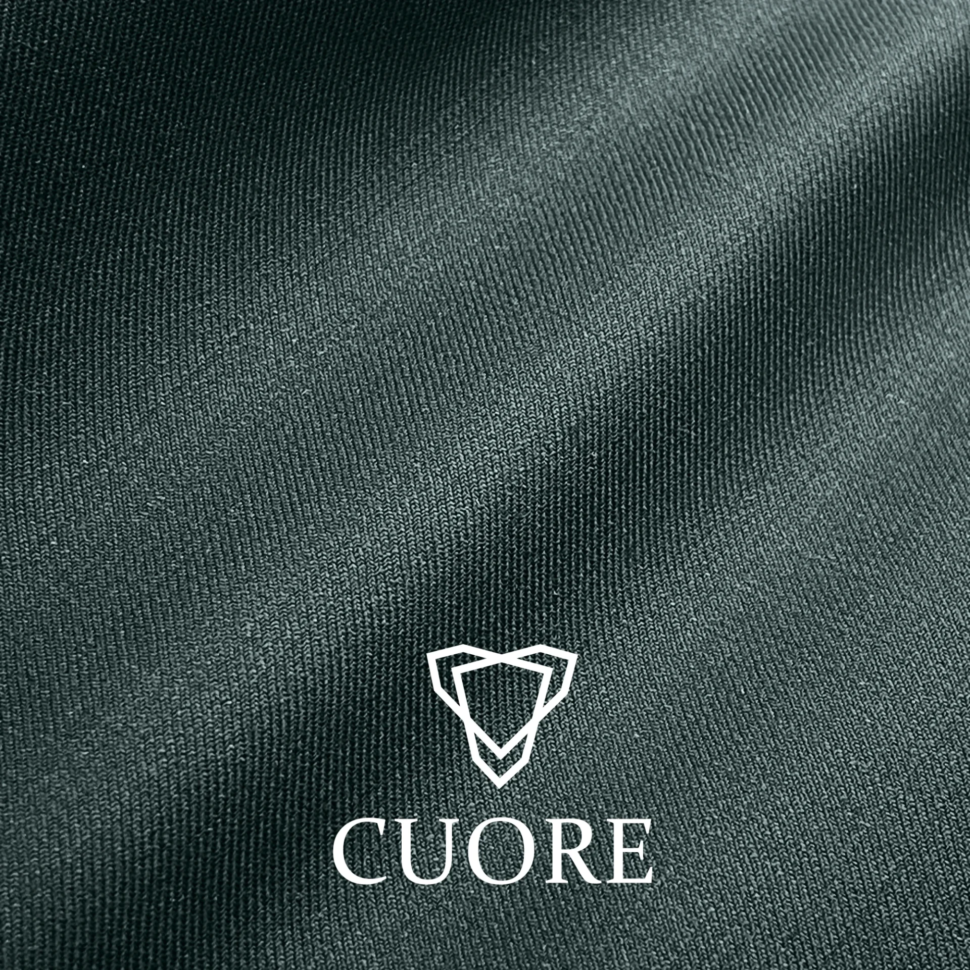 Close-up of premium fabric texture with the Cuore logo and geometric design in white.