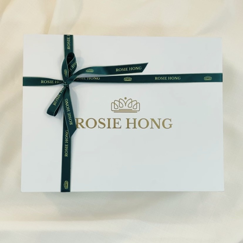 Elegant Rosie Hong gift box with a green ribbon on a white background, perfect for special occasions and gifting.