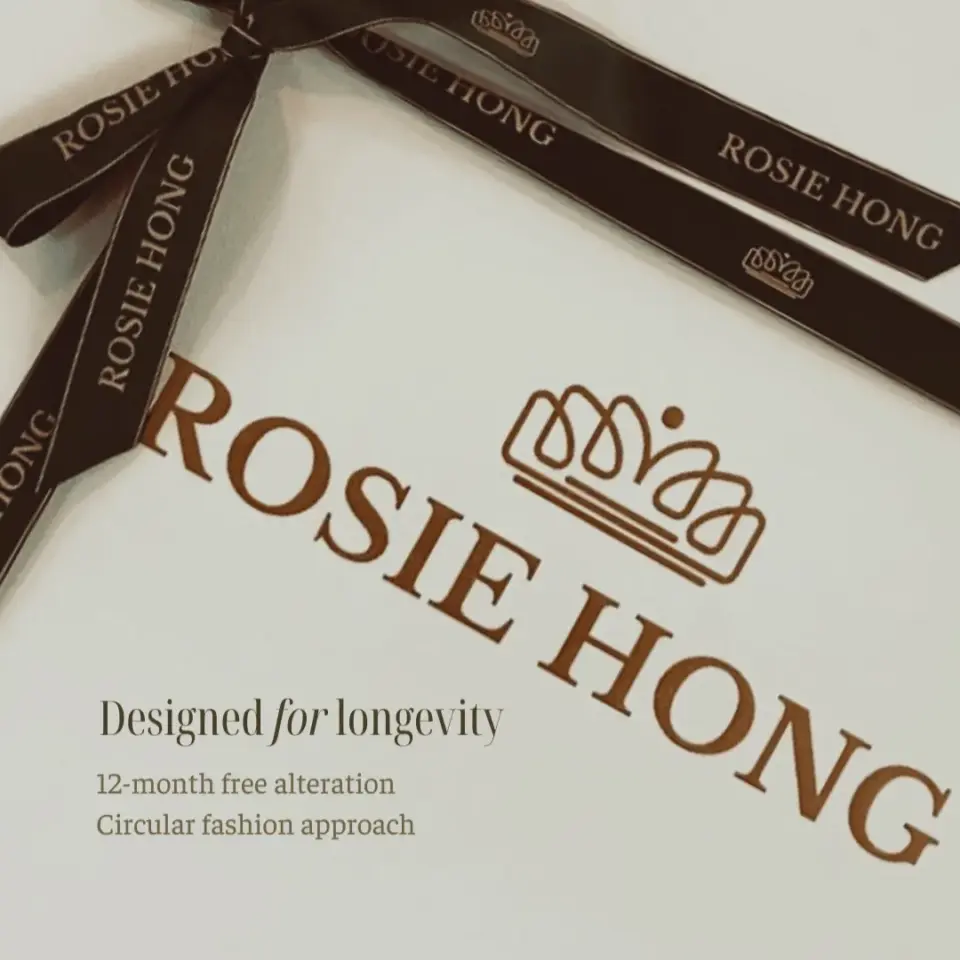 Rosie Hong packaging with ribbon, highlighting sustainability, 12-month free alteration, and circular fashion.