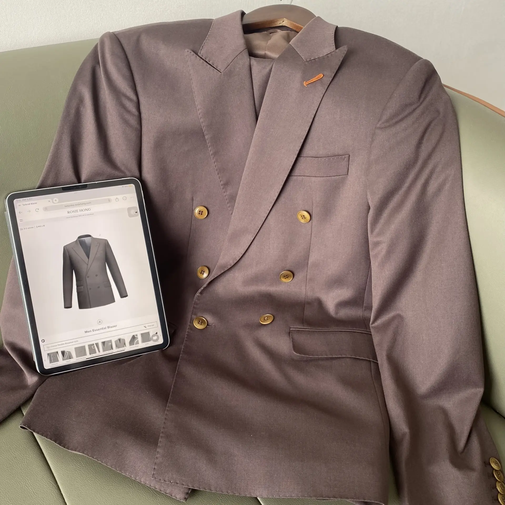 Made-to-Measure Tailors brown double-breasted blazer displayed with its online product page, highlighting refined fit, craftsmanship, and modern bespoke tailoring.