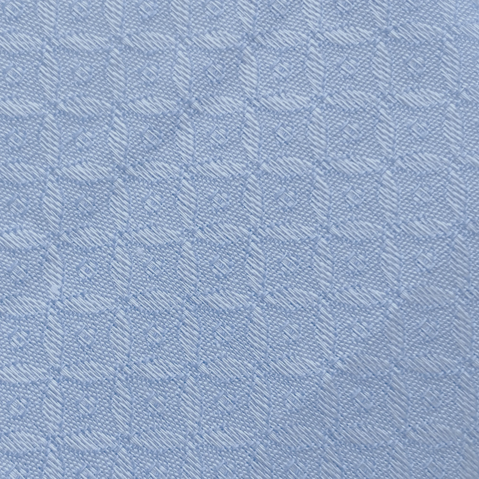 Light blue textured fabric with a small diamond pattern, suitable for clothing or upholstery.