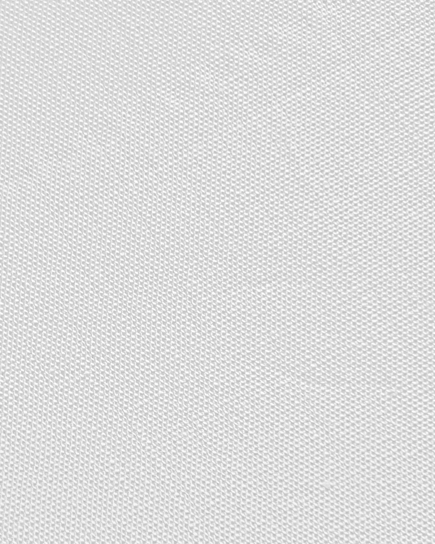 Close-up textured white fabric background, showcasing detailed weave pattern for design and textile inspiration.