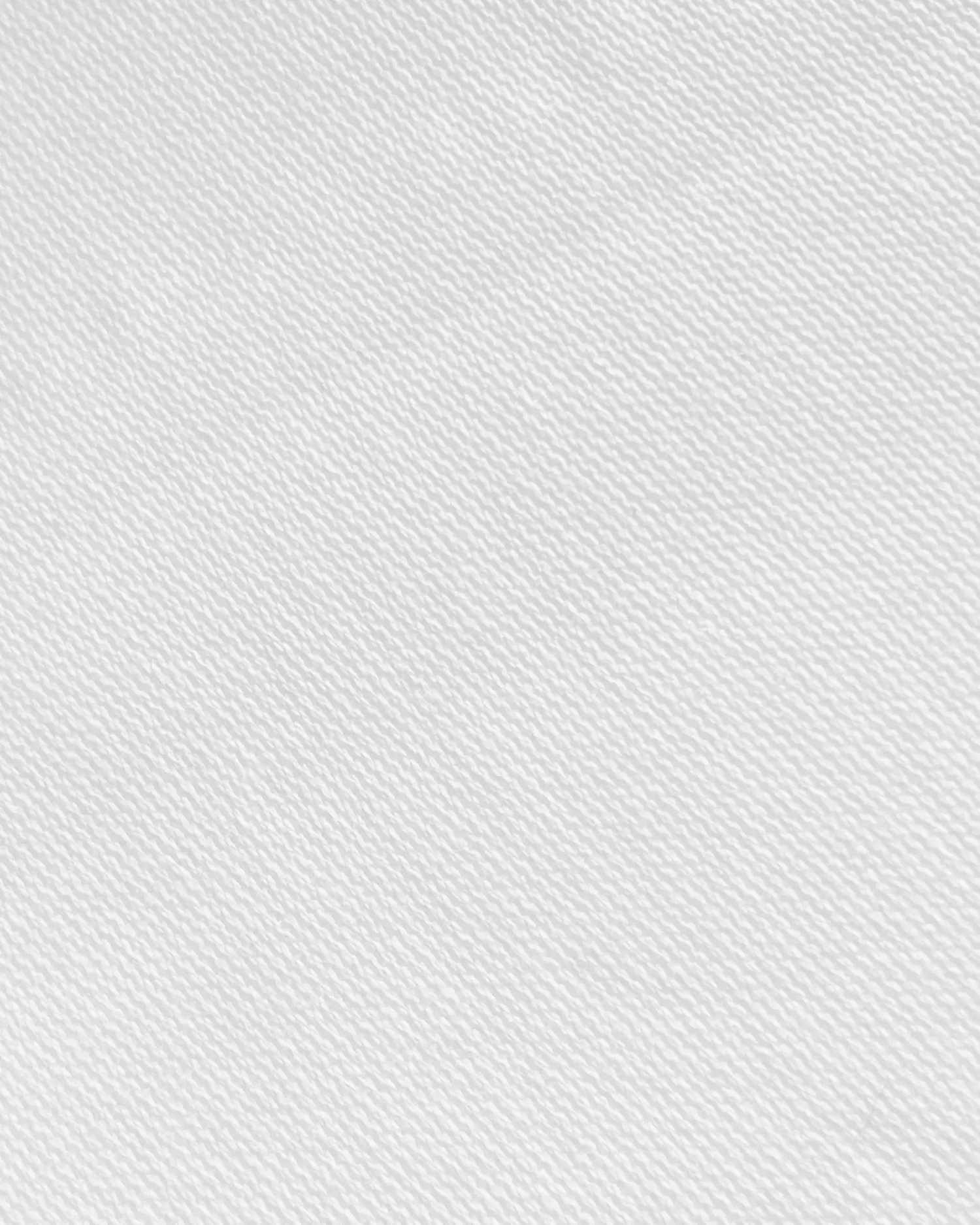 Close-up of textured white fabric, showcasing intricate weave pattern, perfect for textile or design backgrounds.