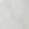 Textured white fabric close-up, highlighting diagonal woven pattern and subtle sheen. Ideal for background or design use.