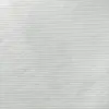 Close-up of white twill fabric texture with diagonal weave pattern.