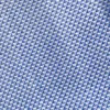 Close-up of blue and white houndstooth fabric pattern, showing detailed texture and design.