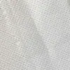 Close-up of white textured fabric with a woven pattern, ideal for upholstery or interior design projects.