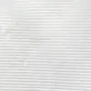 Close-up of white textured fabric with horizontal ribs and detailed stitching pattern.