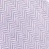 Close-up of a purple herringbone fabric texture with diagonal zigzag pattern.