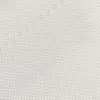 Close-up of white textured fabric, showcasing intricate weave pattern for design and material analysis.