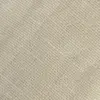 Close-up of beige woven fabric texture, showcasing intricate fiber patterns.