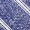 Close-up of blue and white woven fabric with diagonal stripe pattern.