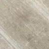 Close-up of beige burlap fabric texture, showing woven fibers and natural pattern.