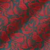 Rich red floral jacquard pattern on textured fabric with a green background.
