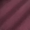 Close-up of soft purple velvet texture with subtle shadows, showcasing its rich, plush surface. Perfect for luxury fabric themes.