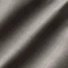Close-up of gray textured fabric with diagonal lines, showing detailed weave pattern for design or textile use.