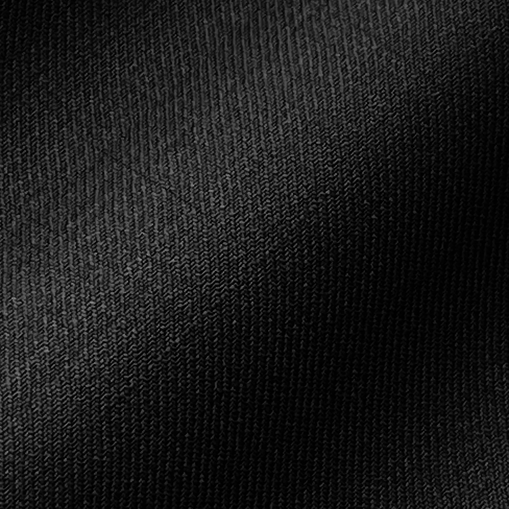 Close-up of black fabric texture showing fine textile pattern and weave details.
