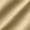 Beige textured fabric close-up with intricate weave pattern and soft light reflections.