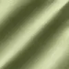 Close-up of smooth, light green satin fabric with a subtle sheen and diagonal folds.