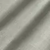 Close-up of textured grey fabric with gentle folds, showcasing fine weave pattern.
