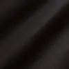 Close-up of smooth black fabric texture with soft shadows and light reflections.