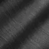 Close-up of gray herringbone fabric with diagonal zigzag pattern and light shadow effect.