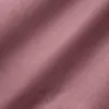 Close-up of mauve colored fabric texture, perfect for fashion and design backgrounds.