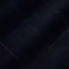 Close-up of dark checkered fabric with subtle red and blue lines, showcasing textured textile pattern.