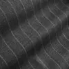 Close-up of gray pinstripe fabric with wavy lines, showcasing texture and pattern details. Ideal for fashion and textile design.