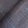 Close-up of textured fabric with a blue check pattern, highlighting detailed weaving suitable for tailoring.