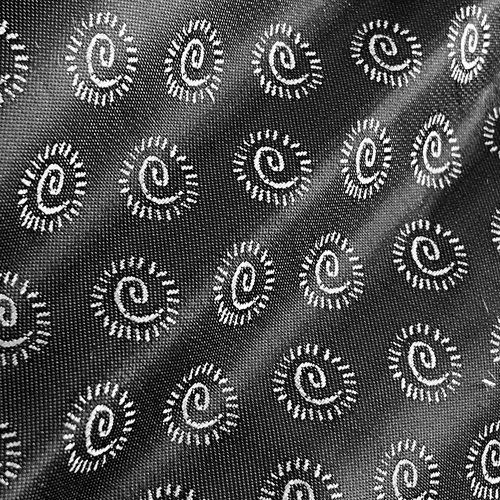 Black fabric with white spiral pattern, creating a textured, circular design for fashion and textile inspiration.