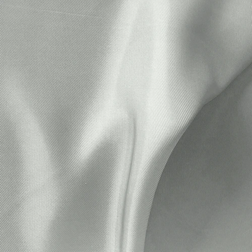 Close-up of smooth, flowing gray fabric with a subtle texture, creating elegant folds and a soft, silky appearance.