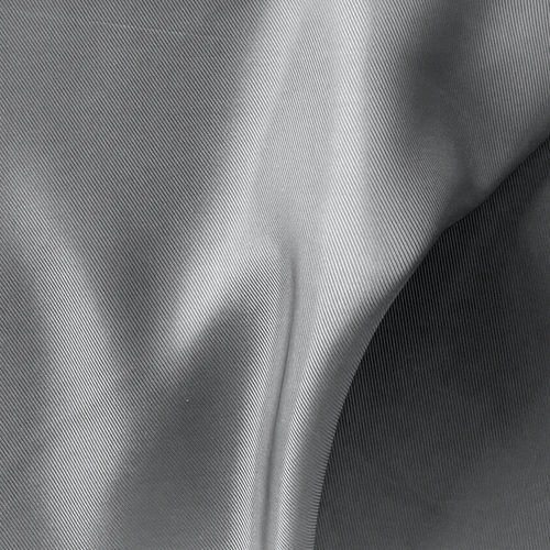 Silky gray fabric texture, smooth folds and soft sheen, ideal for textiles or fashion design visuals.
