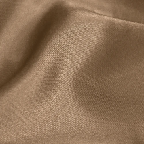 Smooth brown fabric texture close-up, showing soft folds and a silky finish.