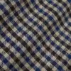 Blue and grey plaid fabric texture with intricate woven pattern.
