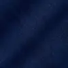 Close-up of textured dark blue fabric with a subtle weave pattern.
