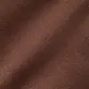 Close-up of brown herringbone fabric texture featuring diagonal patterns and rich color detail.