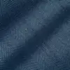 Close-up of blue herringbone fabric texture, showcasing intricate zigzag weave pattern for fashion and design inspiration.