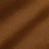 Close-up of brown textured fabric with visible weave pattern. Ideal for textiles, clothing, or upholstery designs.